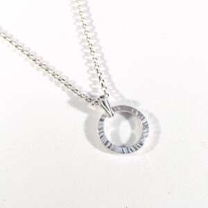 Silver circle necklace with texture