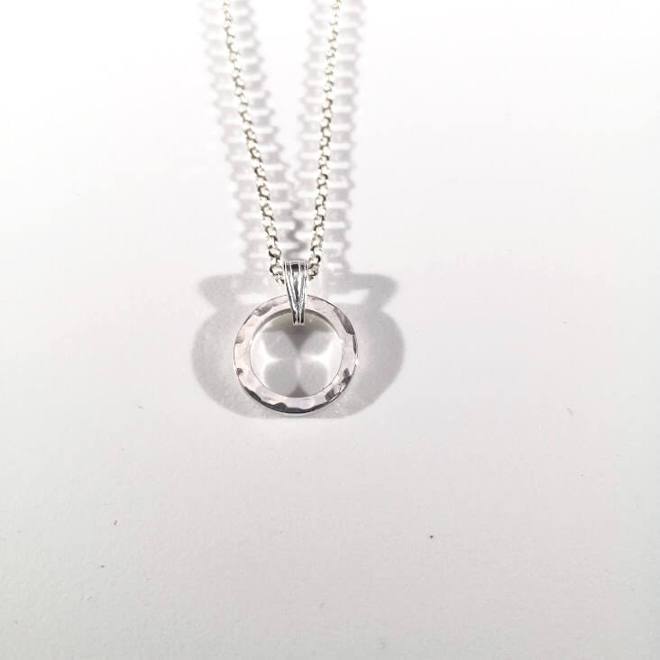 Textured silver pendant