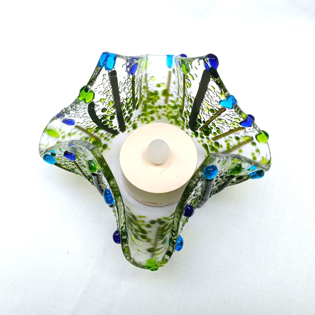Glass tea light holder
